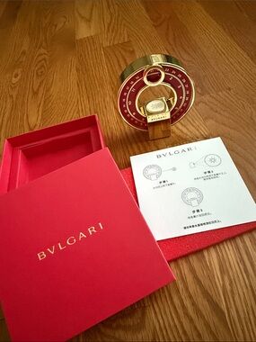 Bulgari Red and Gold Calendar with a ceramic diffuser box.